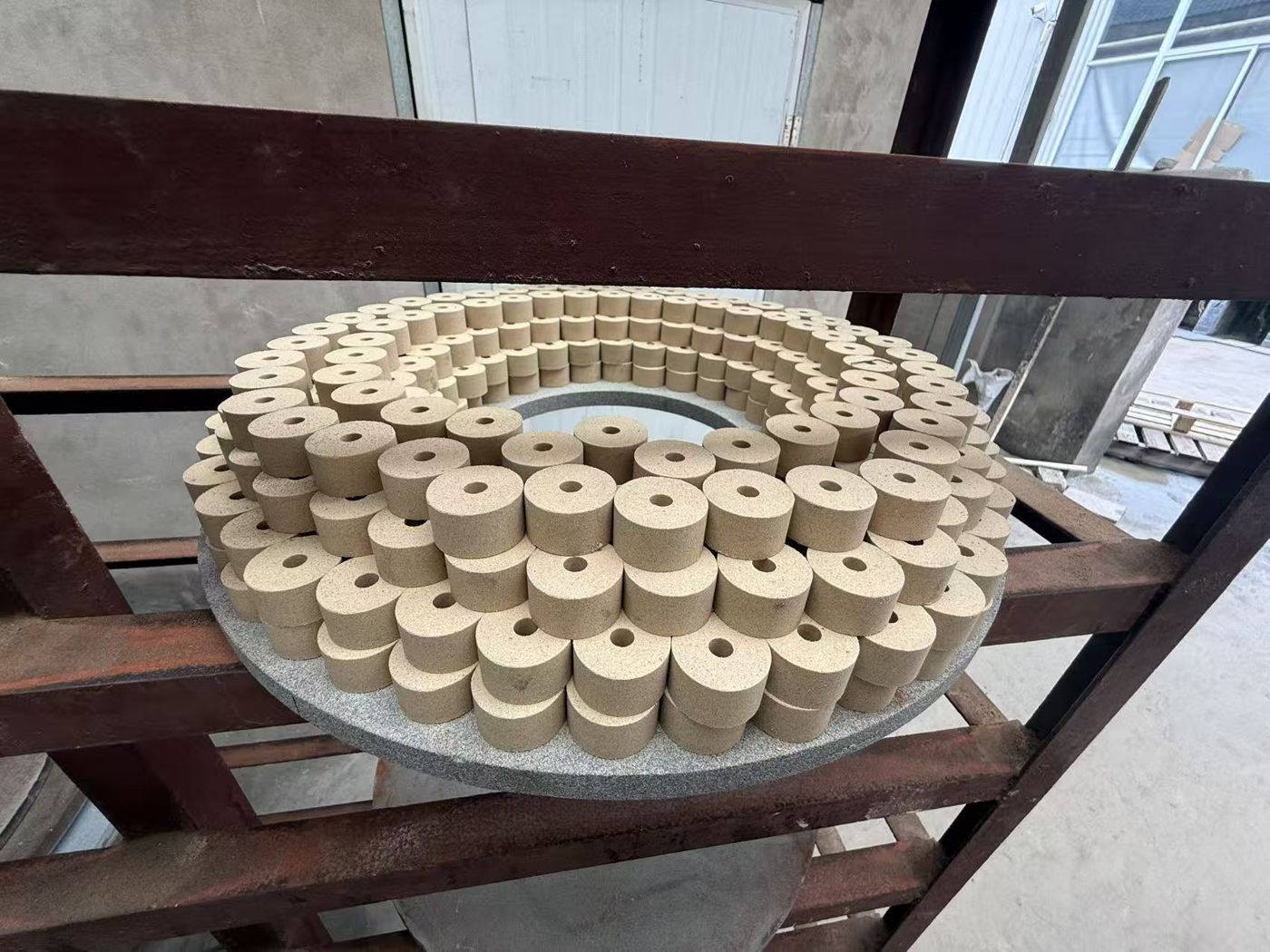 Superfinishing stones on drying racks