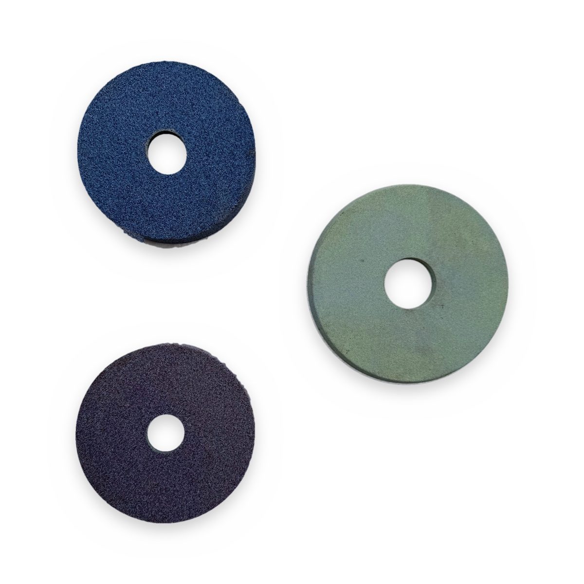 Raceway and rib composite grinding wheels in blue, green and purple